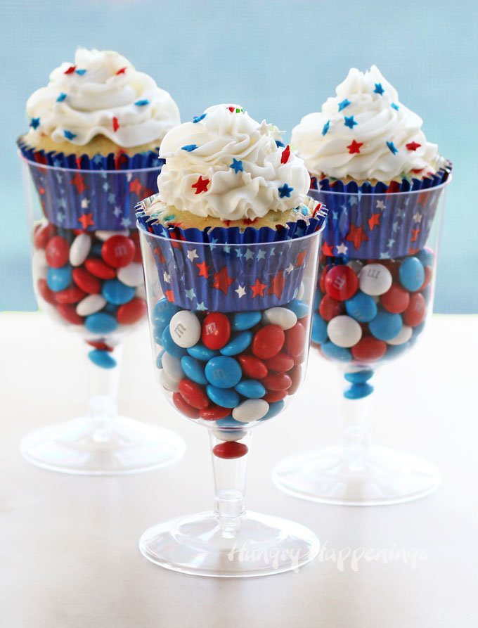 Fourth Of July Snacks And Desserts
 Red White and Blue Cupcakes Served in Wine Goblets