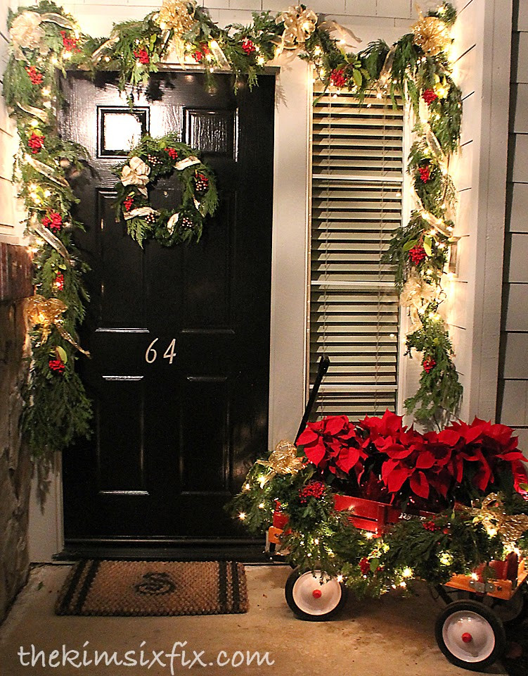 Front Porch Christmas Ideas
 I think I like it best at night when everything is lit up