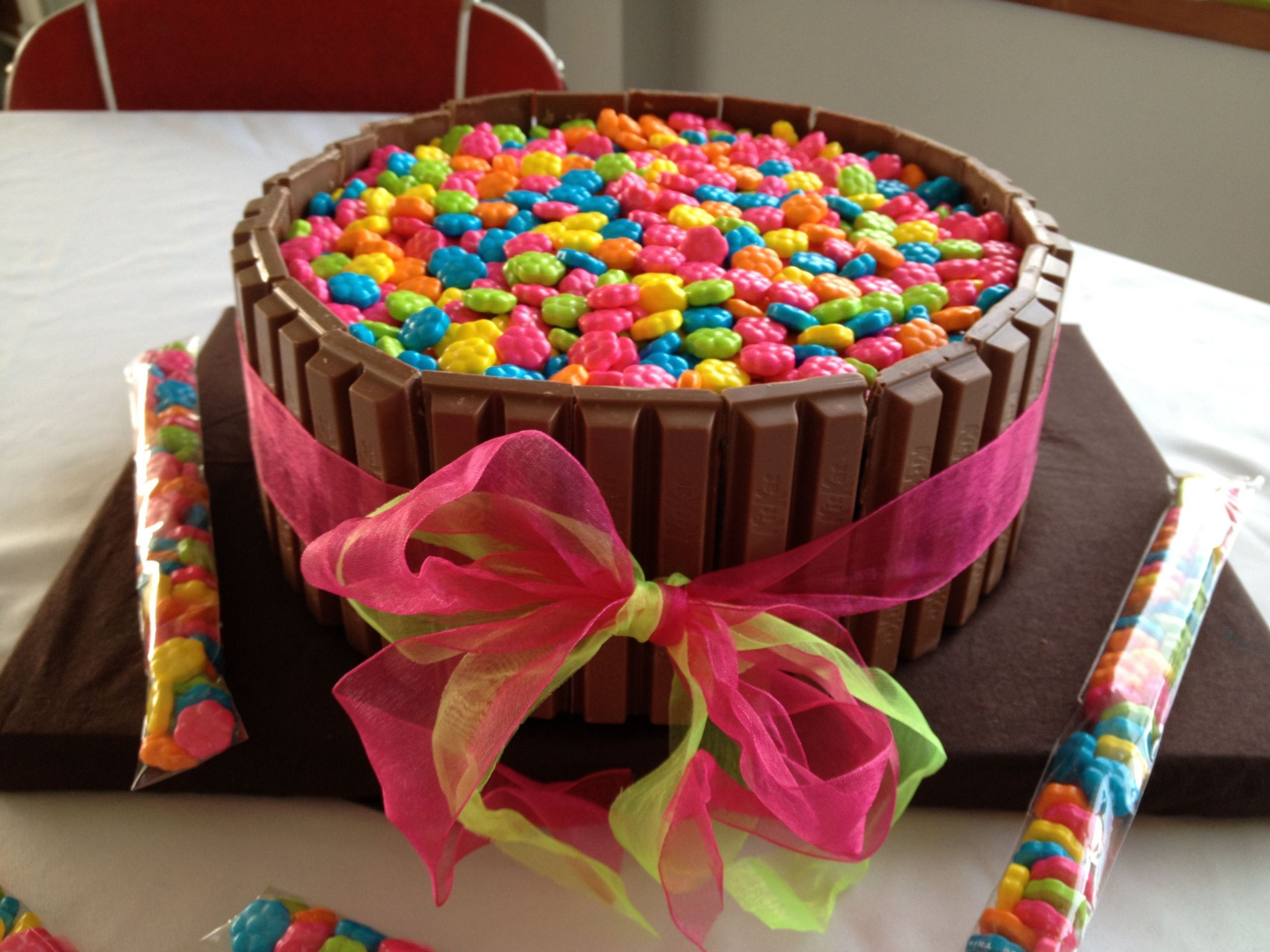 Fun Birthday Party Ideas For 13 Year Olds
 Kit Kat Cake with Mini Flower Can s for my 13 year old s