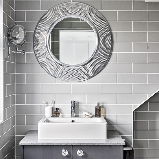 Grey Bathroom Mirror
 Modern grey bathroom with round mirrors