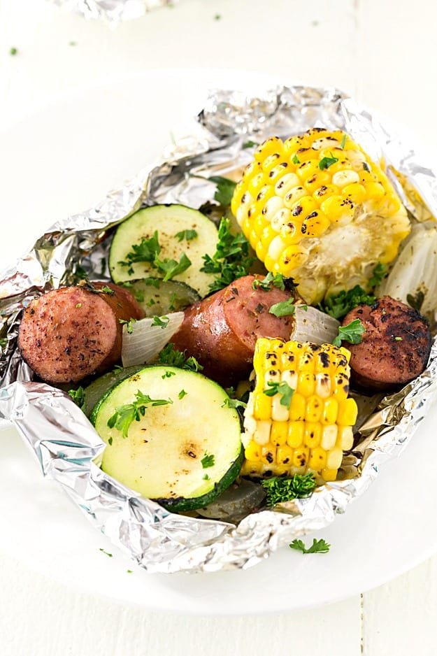 Grilled Corn In Foil
 Kielbasa Sausage & Grilled Ve ables in Foil Gal on a