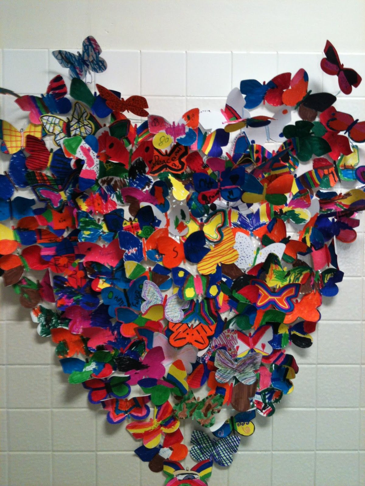 Group Art Project For Adults
 Collaborative Butterfly Heart I could see making this
