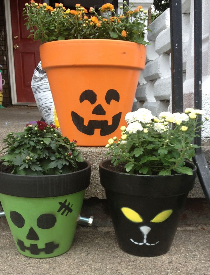 Halloween Flower Pots
 2166 best Clay Pots images on Pinterest