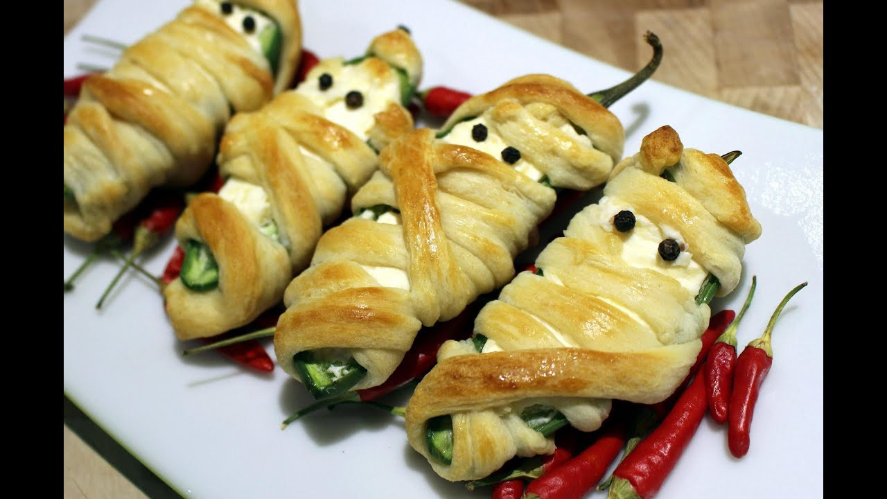 Halloween Jalapeno Poppers
 Jalapeno popper Mummy recipe for your Halloween party food