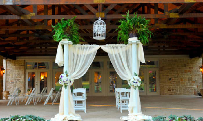 How To Decorate A Wedding Arch With Fabric
 Get Inspired to DIY a Wedding Arch with Silk Flowers for