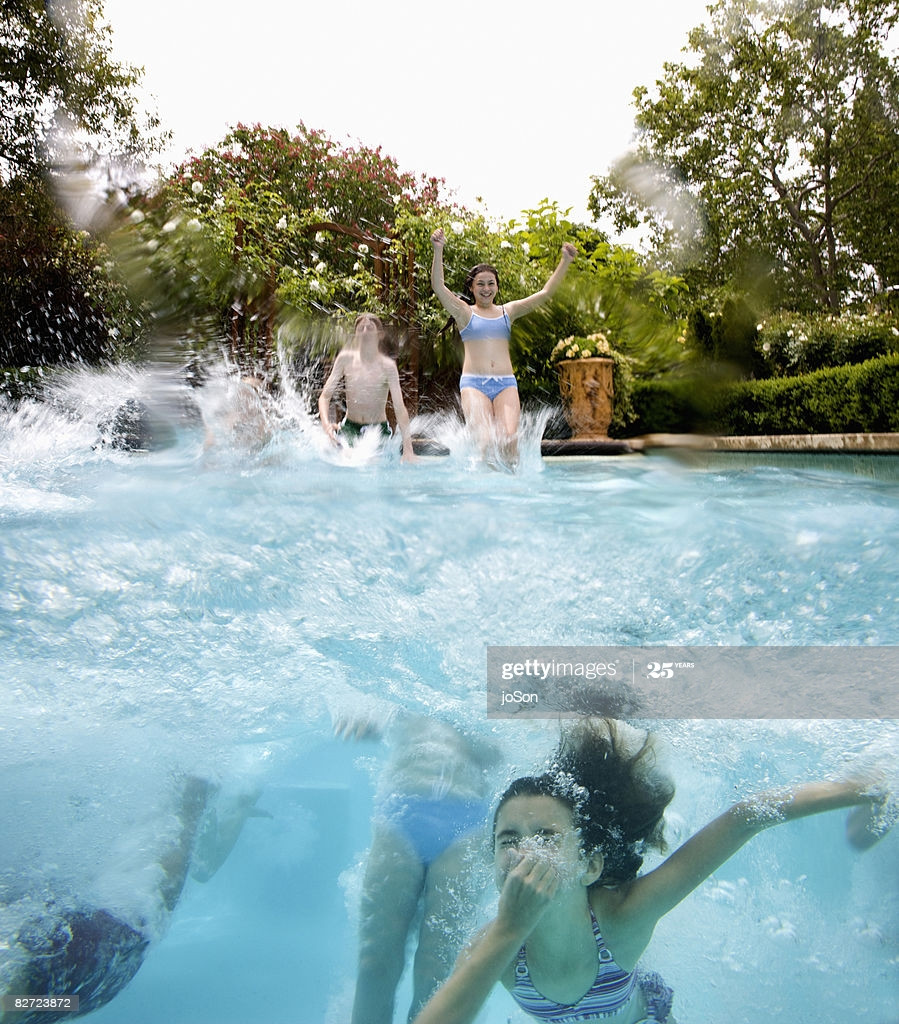 Kids Outdoor Swimming Pool
 Kids Jumping Into Outdoor Swimming Pool High Res Stock