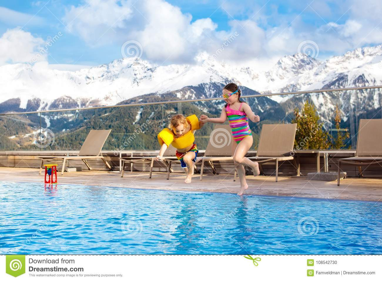 Kids Outdoor Swimming Pool
 Kids In Outdoor Swimming Pool Alpine Resort Stock