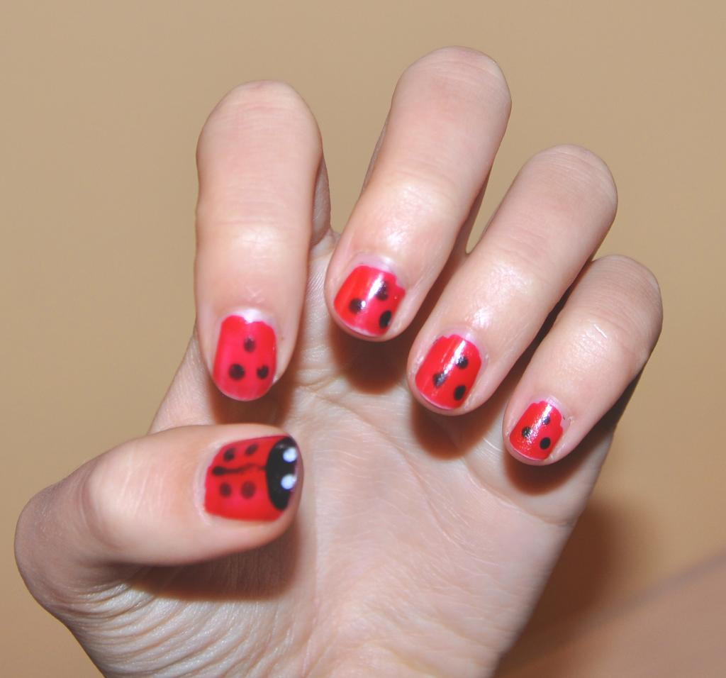 Ladybug Nail Art
 Ladybug nail art by Rose Emblum on DeviantArt