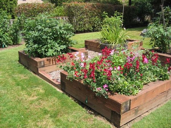 Landscape Timber Flower Bed Designs
 How to build a raised garden bed – clever landscaping ideas