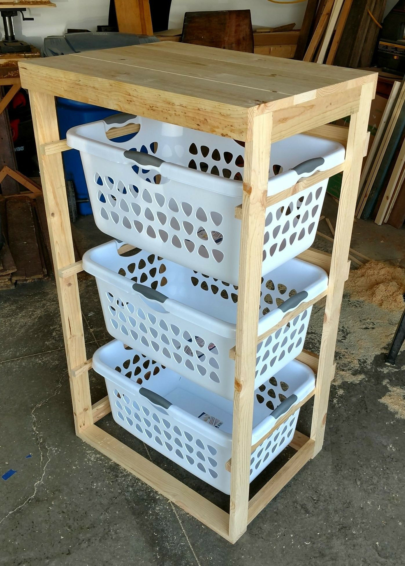 Laundry Basket Rack DIY
 3 tier laundry rack Total cost to build including 3