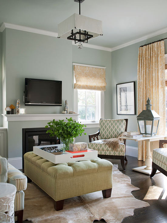 Light Living Room Colors
 Green Tufted Ottoman Cottage living room BHG