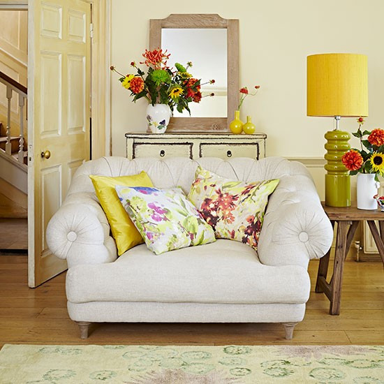 Light Yellow Living Room
 Pale yellow living room with floral cushions