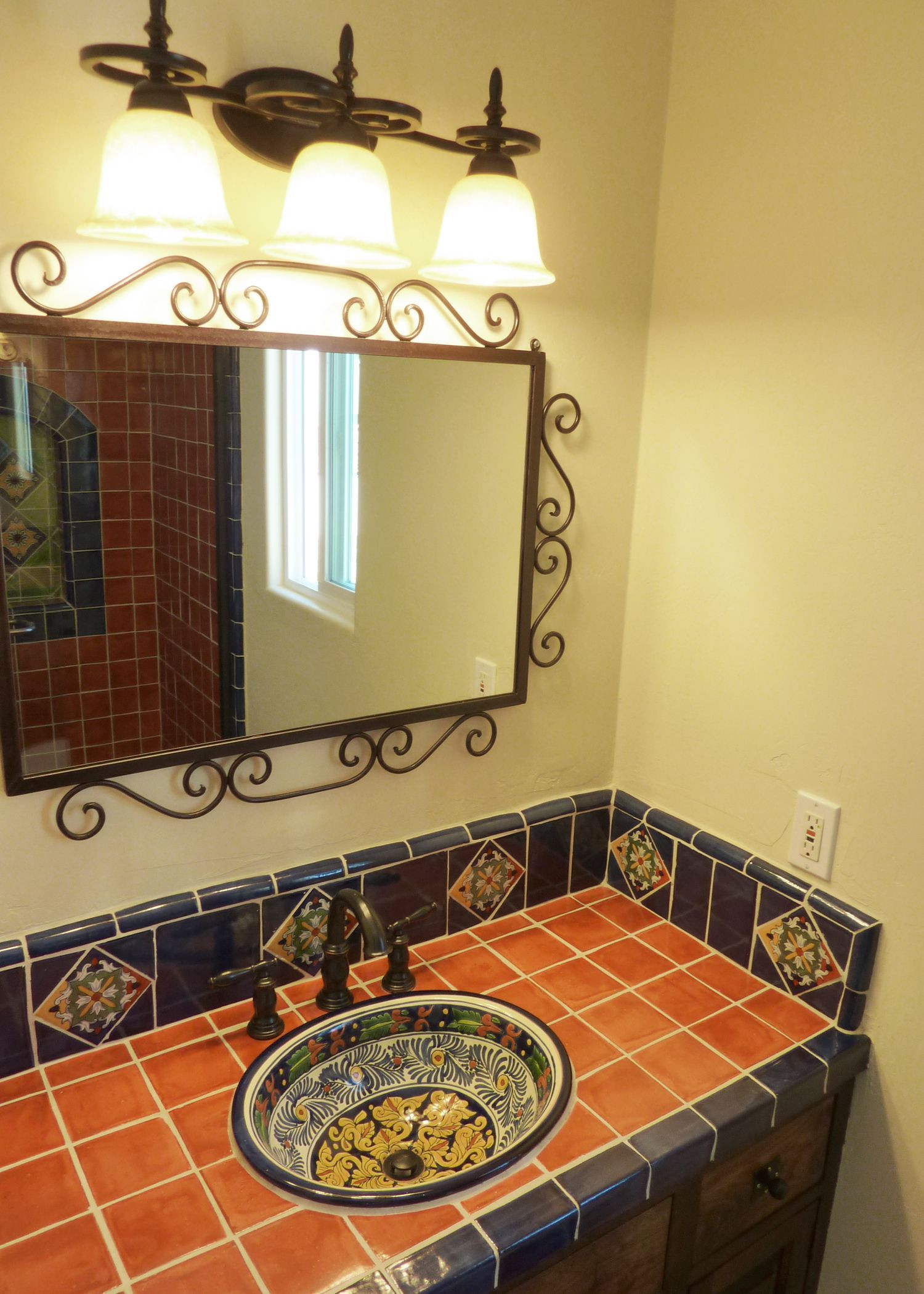 Mexican Bathroom Vanity
 Bathroom vanity using Mexican tiles by kristiblackdesigns