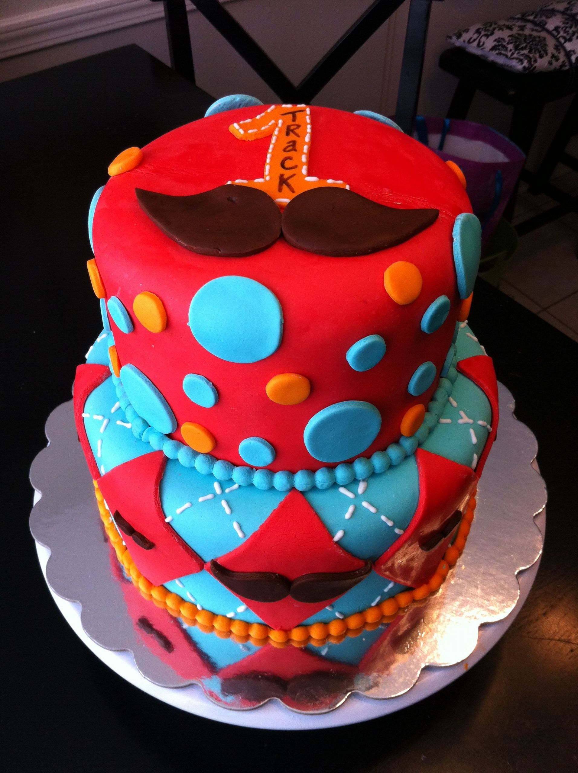 Mustache Birthday Cake
 Mustache themed birthday cake with argyle print