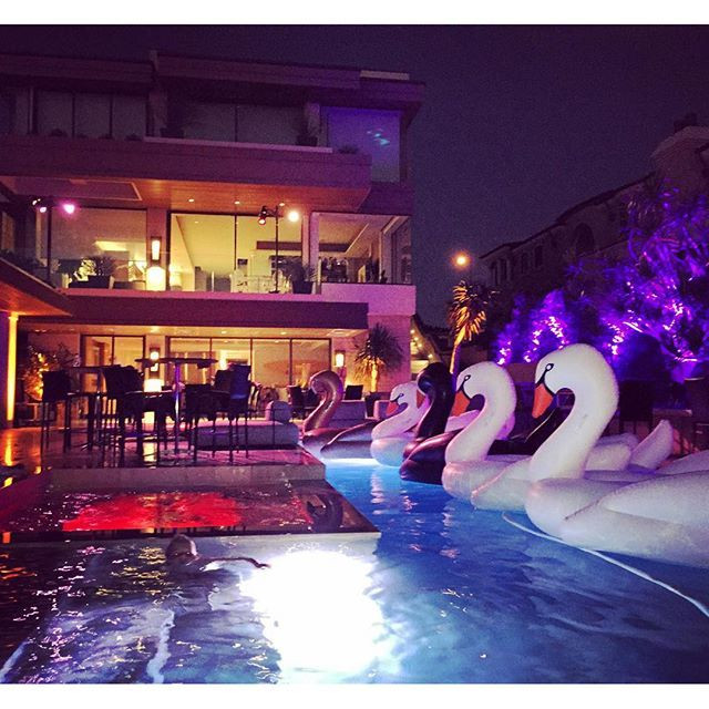 Night Pool Party Ideas
 White Swan Pool Float