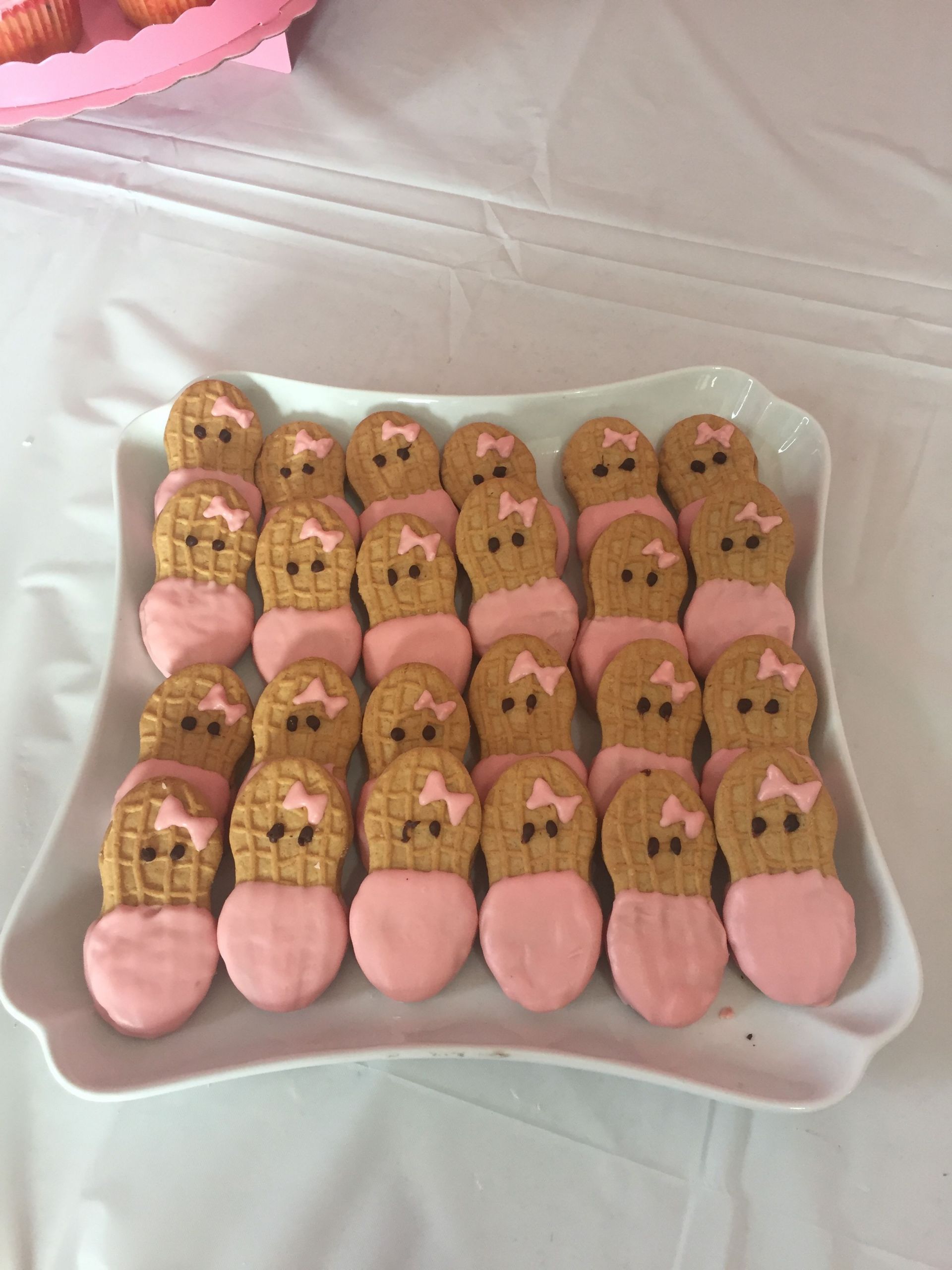Nutter Butter Baby Shower Cookies
 Pink chocolate dipped cookies Baby in a Blanket Nutter