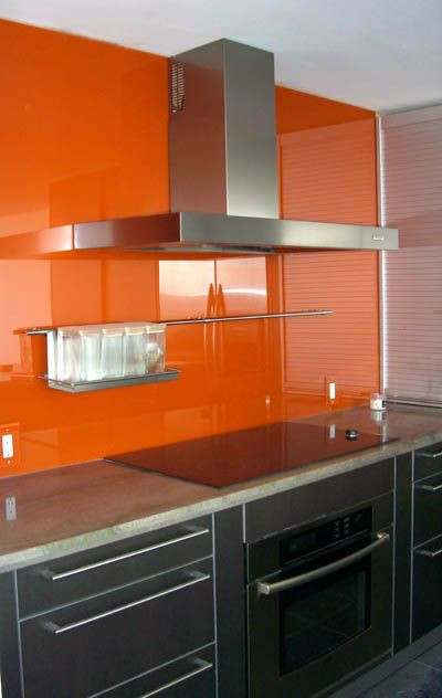 Orange Backsplash Kitchen
 I love the orange painted glass backsplash ours would not