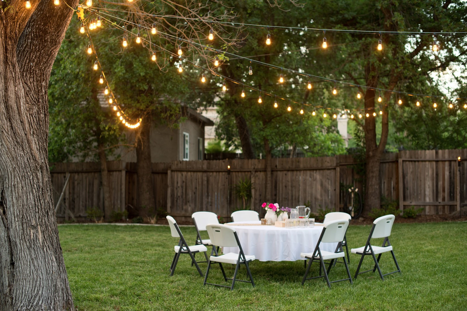 Outdoor Lighting Ideas For Backyard Party
 Domestic Fashionista Backyard Anniversary Dinner Party