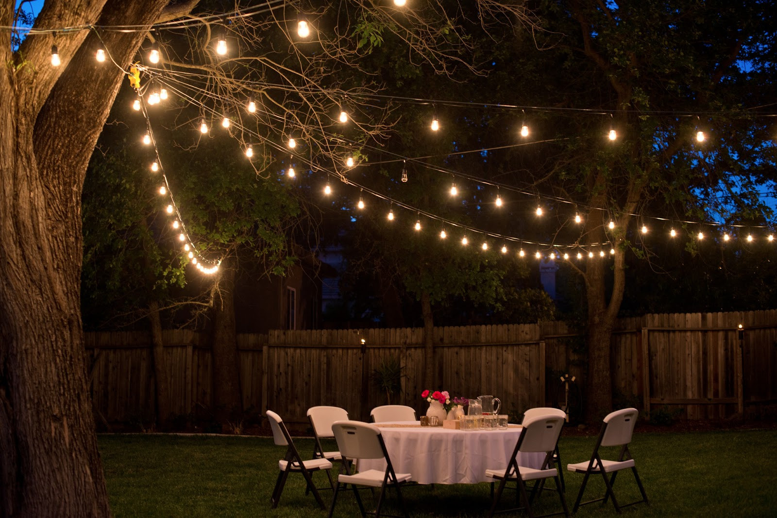 Outdoor Lighting Ideas For Backyard Party
 Domestic Fashionista Backyard Anniversary Dinner Party