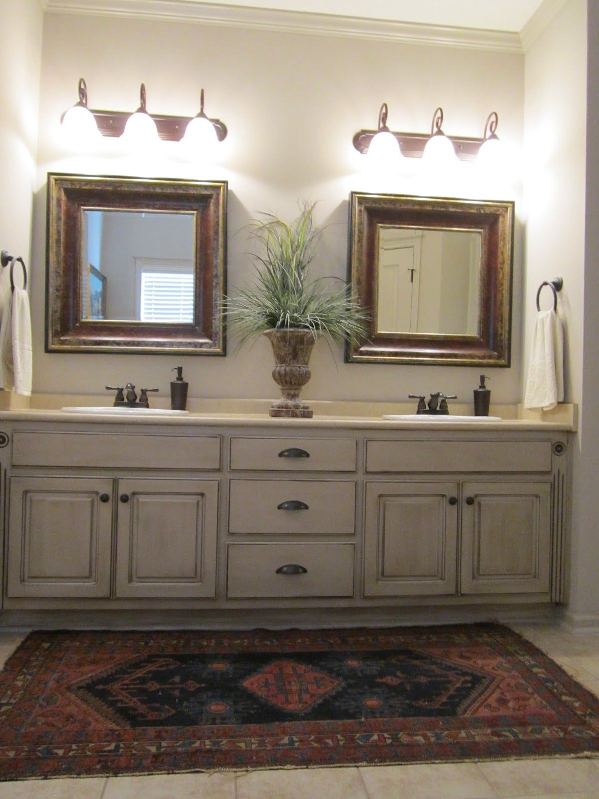 Paint Bathroom Cabinets
 Love these painted bathroom cabinets and the lights What