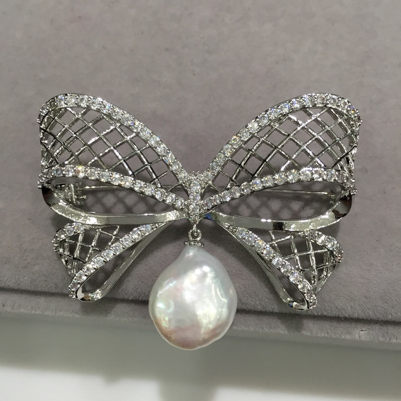 Pearl Brooches
 Baroque Natural freshwater pearl brooch bowknot real pearl