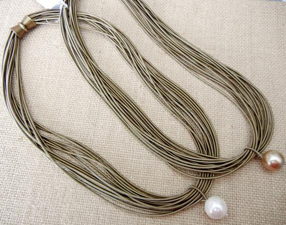 Piano Wire Necklace
 Piano Wire Necklace Gold with pearl