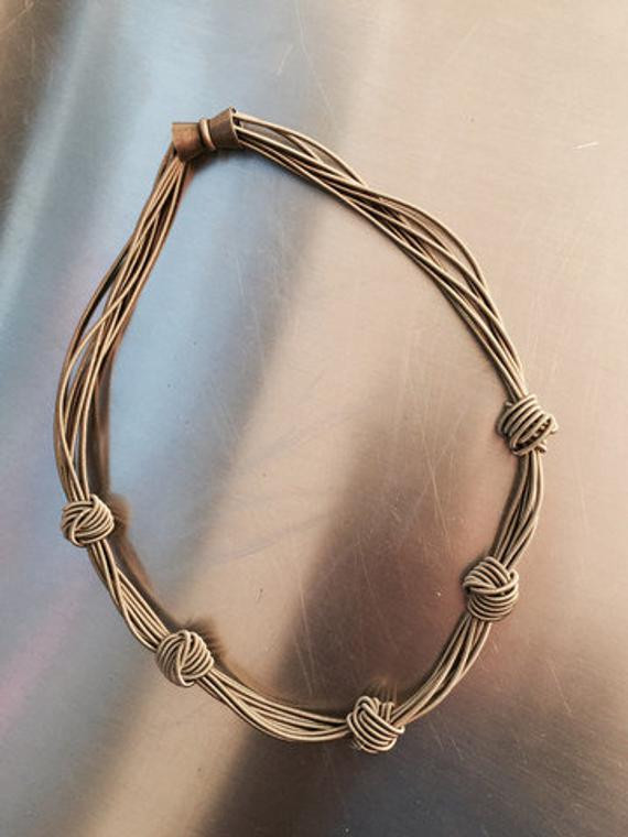 Piano Wire Necklace
 Piano Wire Bronze knots necklace