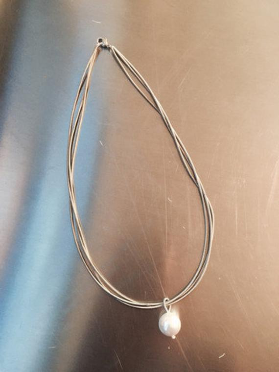 Piano Wire Necklace
 Piano Wire Necklace Silver with white pearl