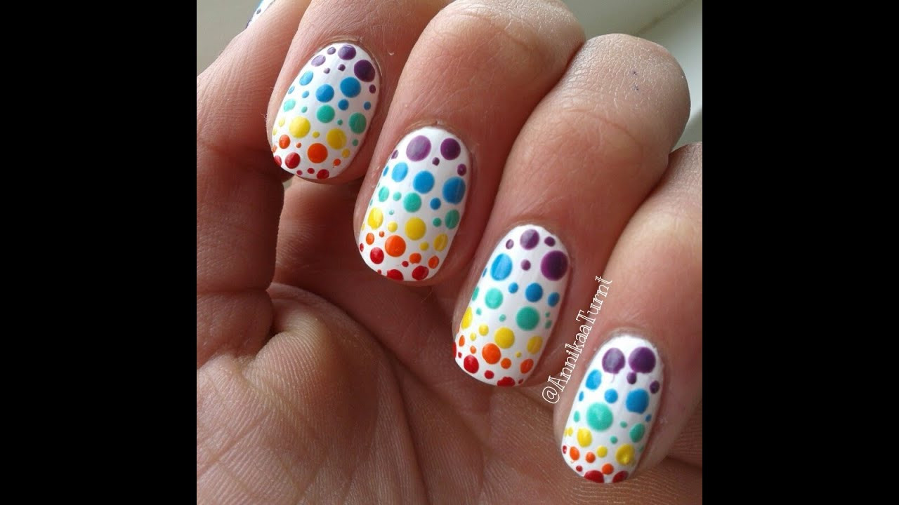 Polka Dots Nail Art
 Colorful polka dots nail art
