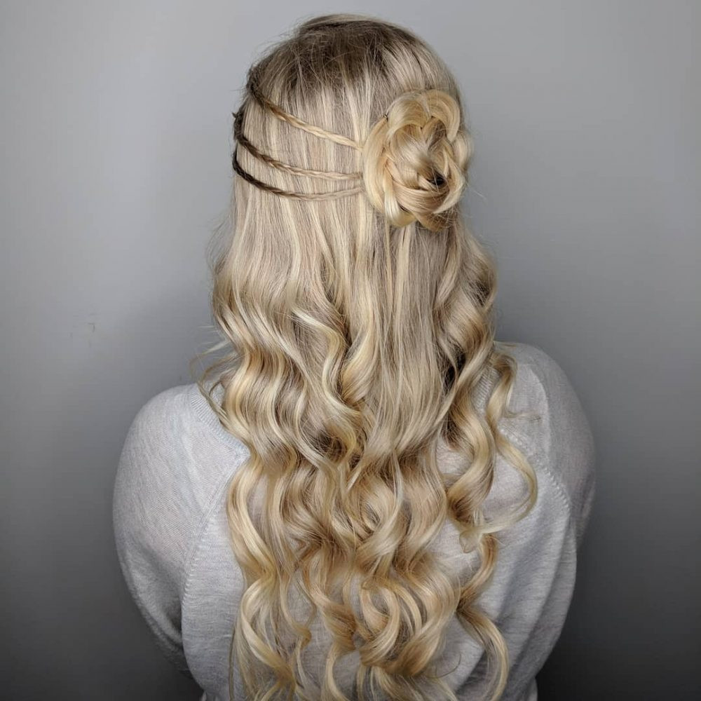Prom Hairstyles With Flowers
 27 Prettiest Half Up Half Down Prom Hairstyles for 2020