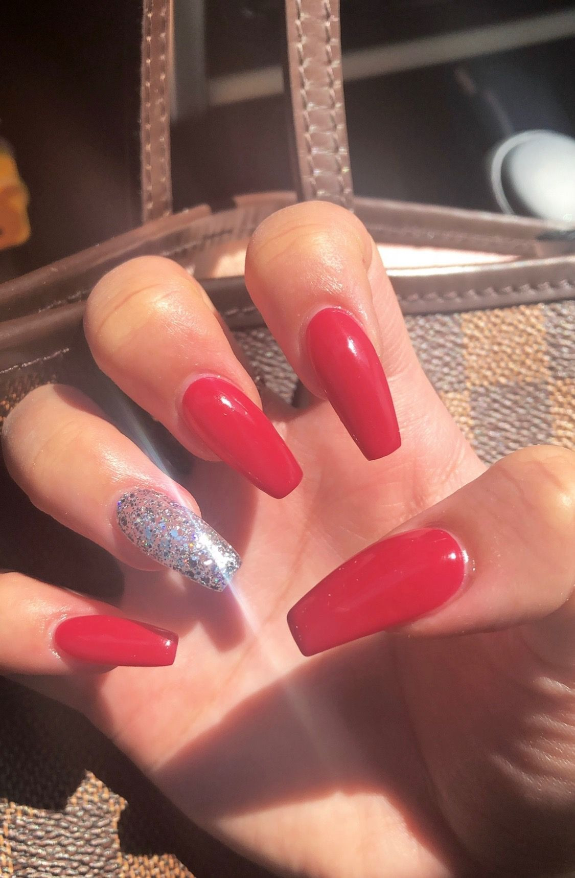 Red And Silver Glitter Nails
 Red coffin nails silver glitter