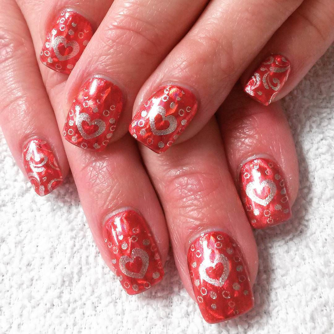 Red And Silver Glitter Nails
 Pretty Red Nail Designs
