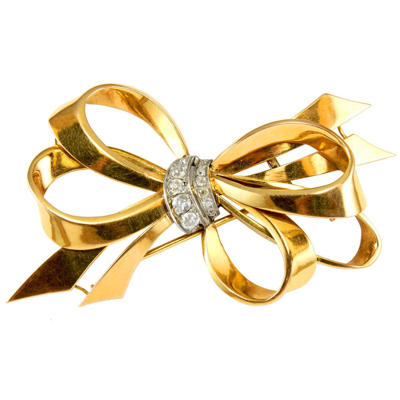 Ribbon Brooches
 Cartier 1940s Diamond Gold Ribbon Bow Brooch at 1stdibs