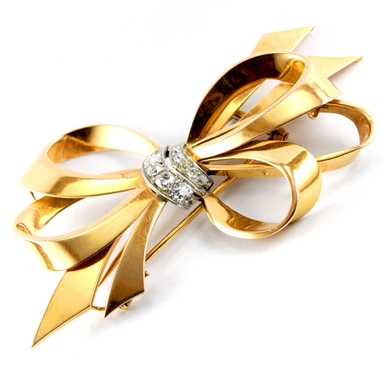 Ribbon Brooches
 Cartier 1940s Diamond Gold Ribbon Bow Brooch at 1stdibs