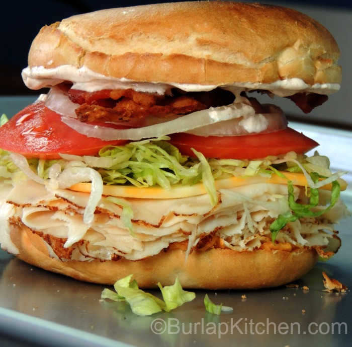 Roasted Chicken Sandwich
 Oven roasted Chicken Club on a Bagel Burlap Kitchen