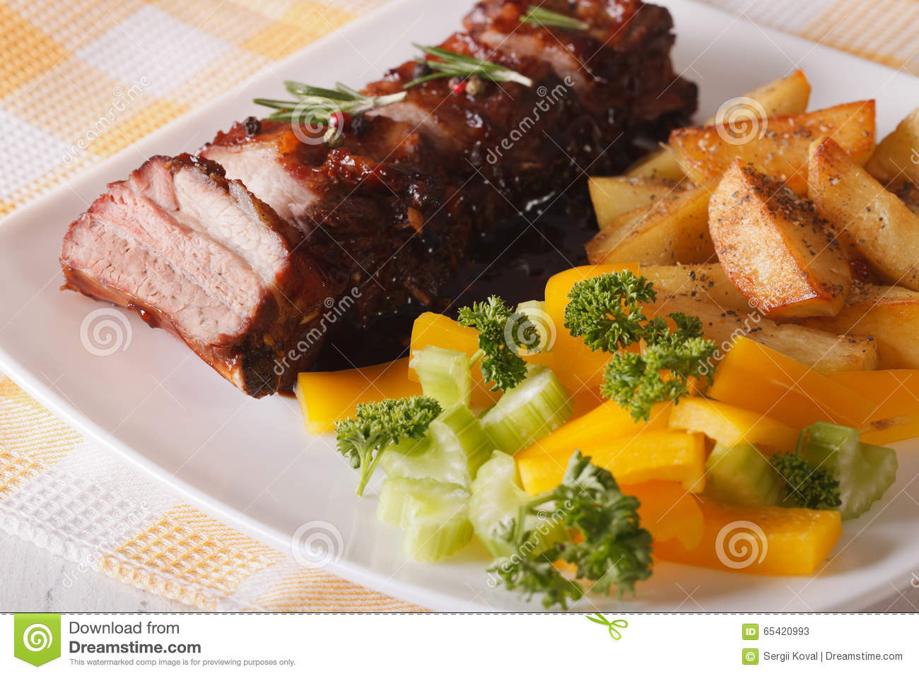 Side Dishes For Spare Ribs
 BBQ Pork Ribs With A Side Dish Ve ables Close up