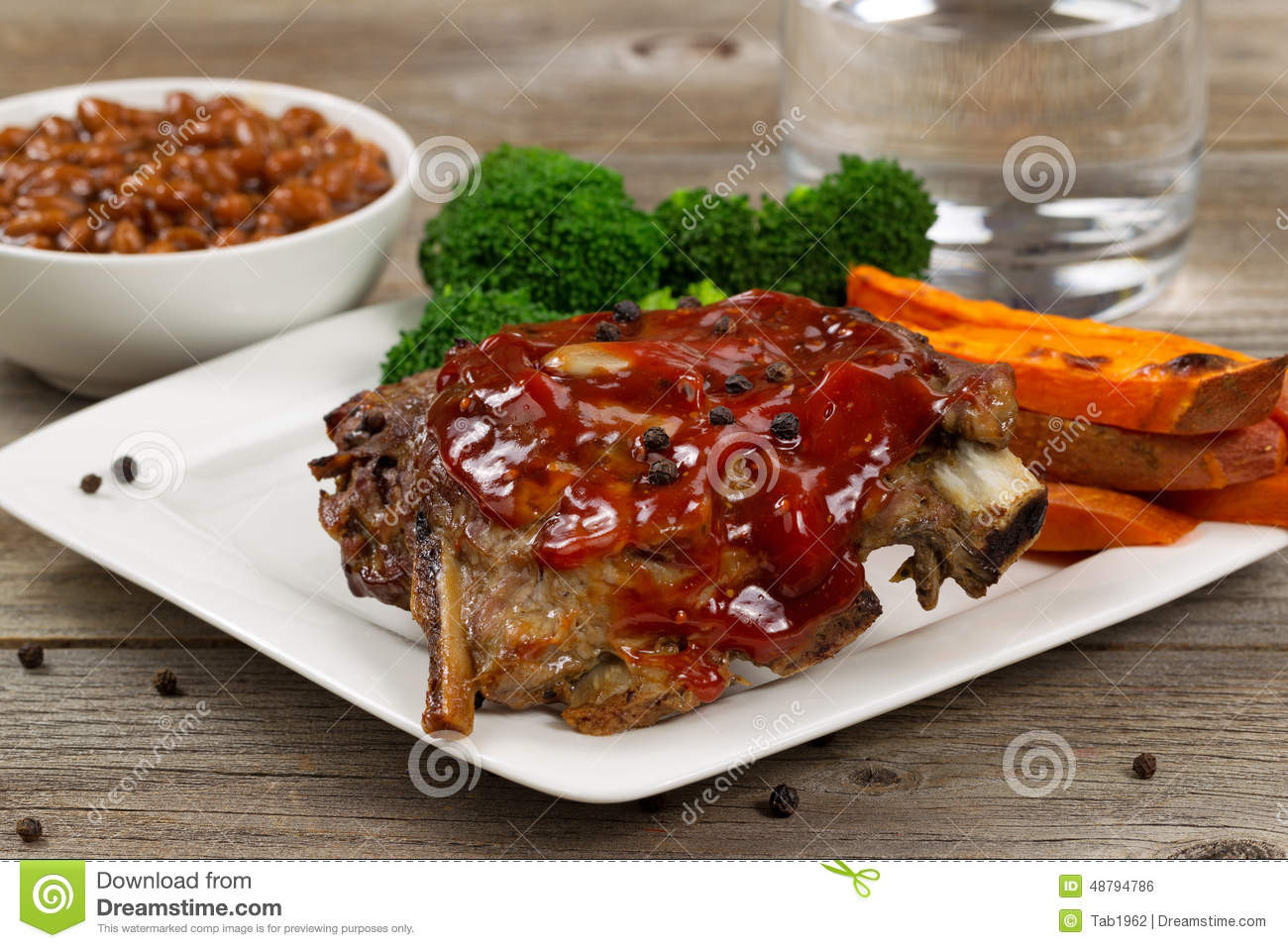 Side Dishes For Spare Ribs
 Juicy BBQ Ribs And Side Dishes With Water Stock