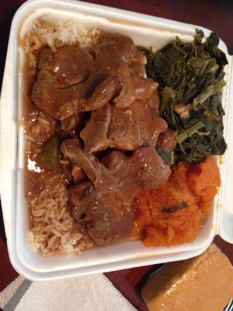 Smothered Pork Chops And Rice
 Smothered Pork Chops over rice sweet potatoes and collard