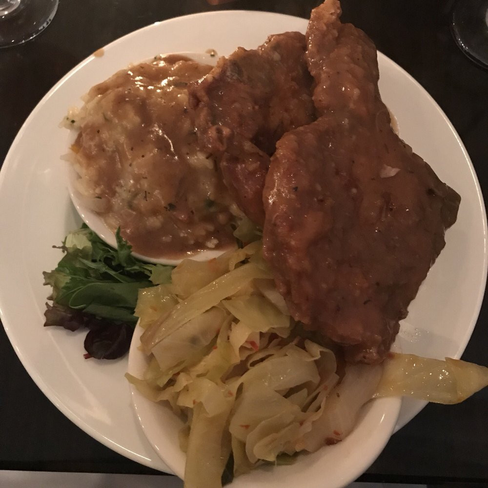 Smothered Pork Chops And Rice
 Smothered Pork Chops cabbage and rice with gravy Yelp