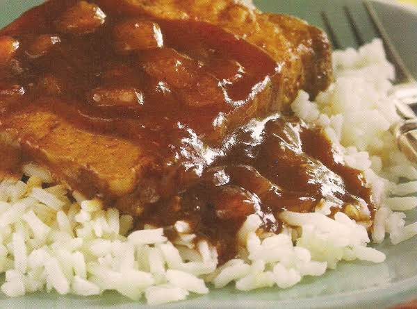Smothered Pork Chops And Rice
 Smothered Pork Chops Over Rice