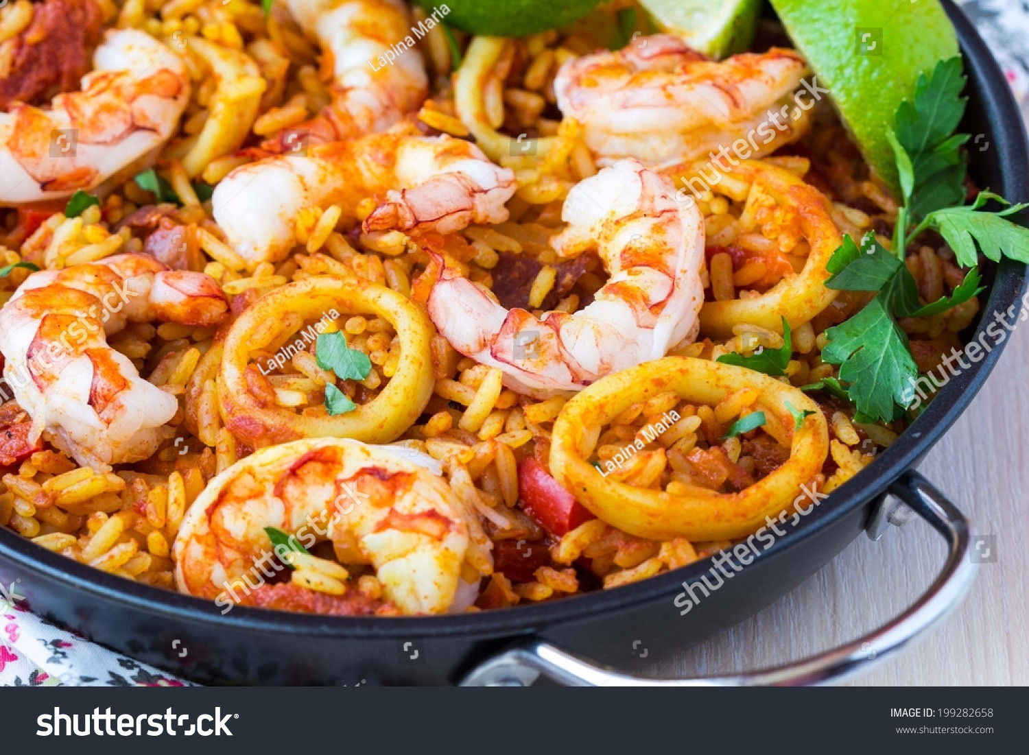 Spanish Rice Dish With Seafood
 Spanish Dish Paella With Seafood Shrimps Squid Rice