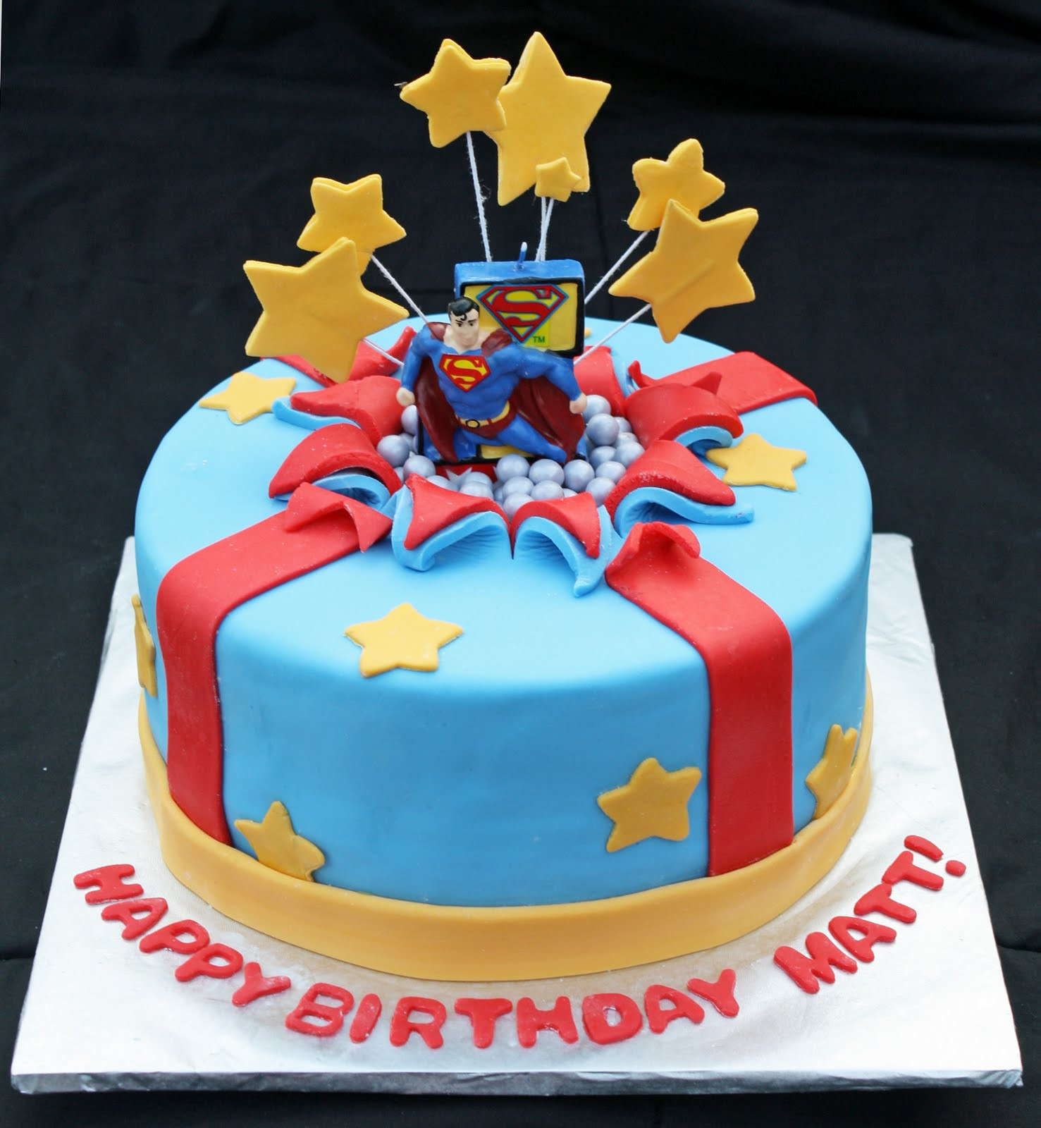 Superman Birthday Cakes
 Superman Bursting Out of the Birthday Cake Rose Bakes