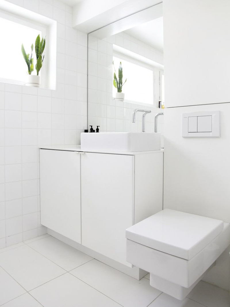 Tiled Bathroom Floors
 White bathroom wall tiles