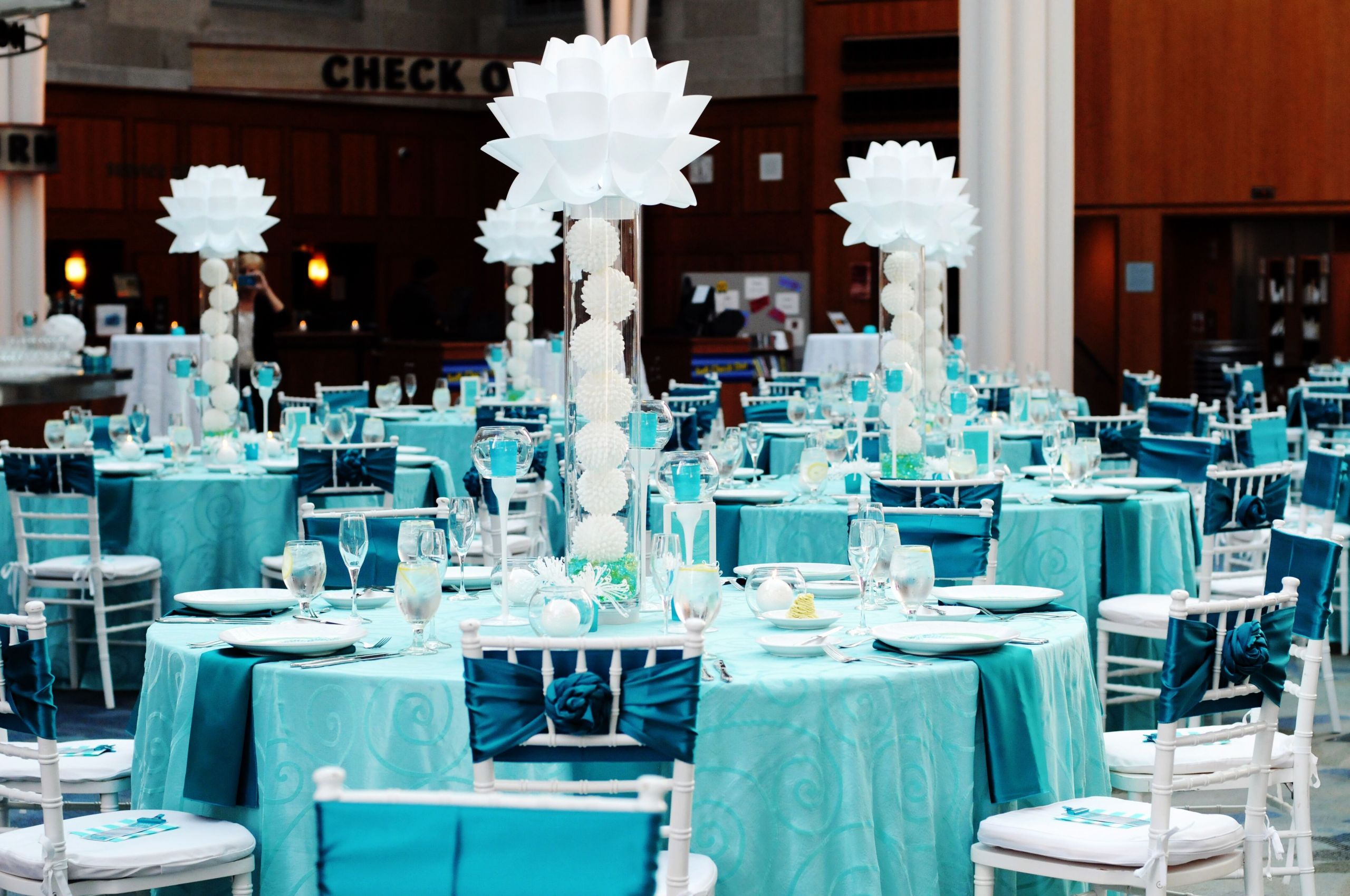 Turquoise Wedding Decorations
 Bold Turquoise Reception with Modern Centerpieces
