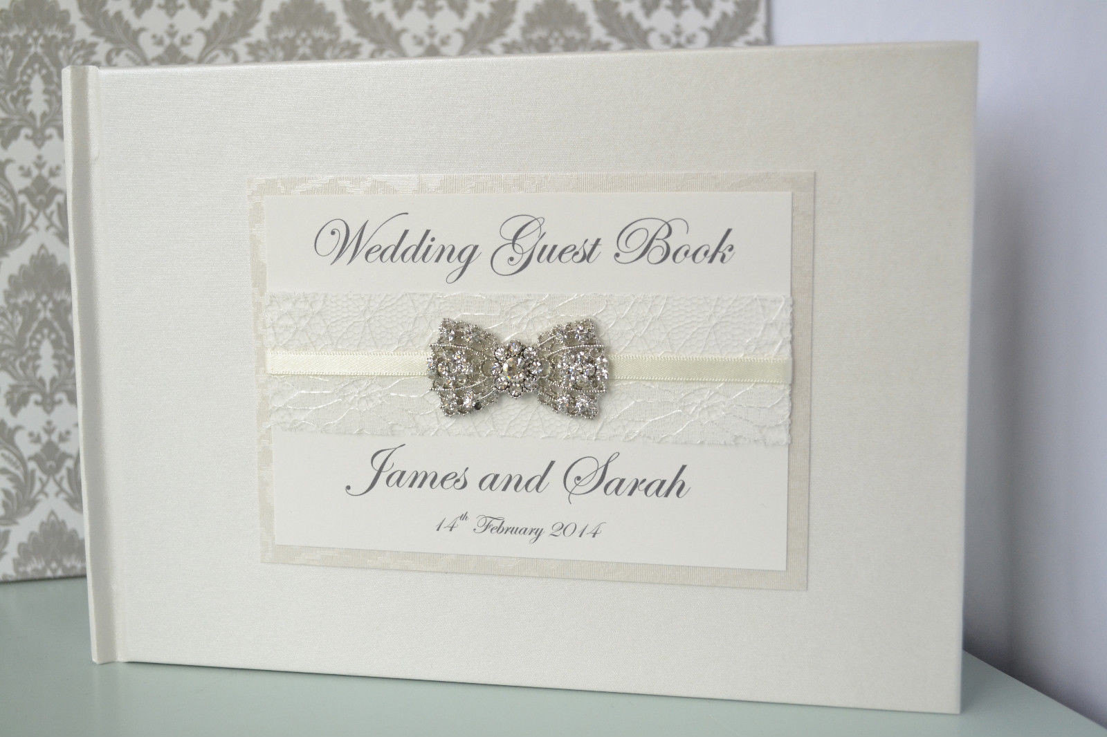 Wedding Guest Book Ivory
 Ivory Wedding Guest Book with Beautiful Lace Ribbon