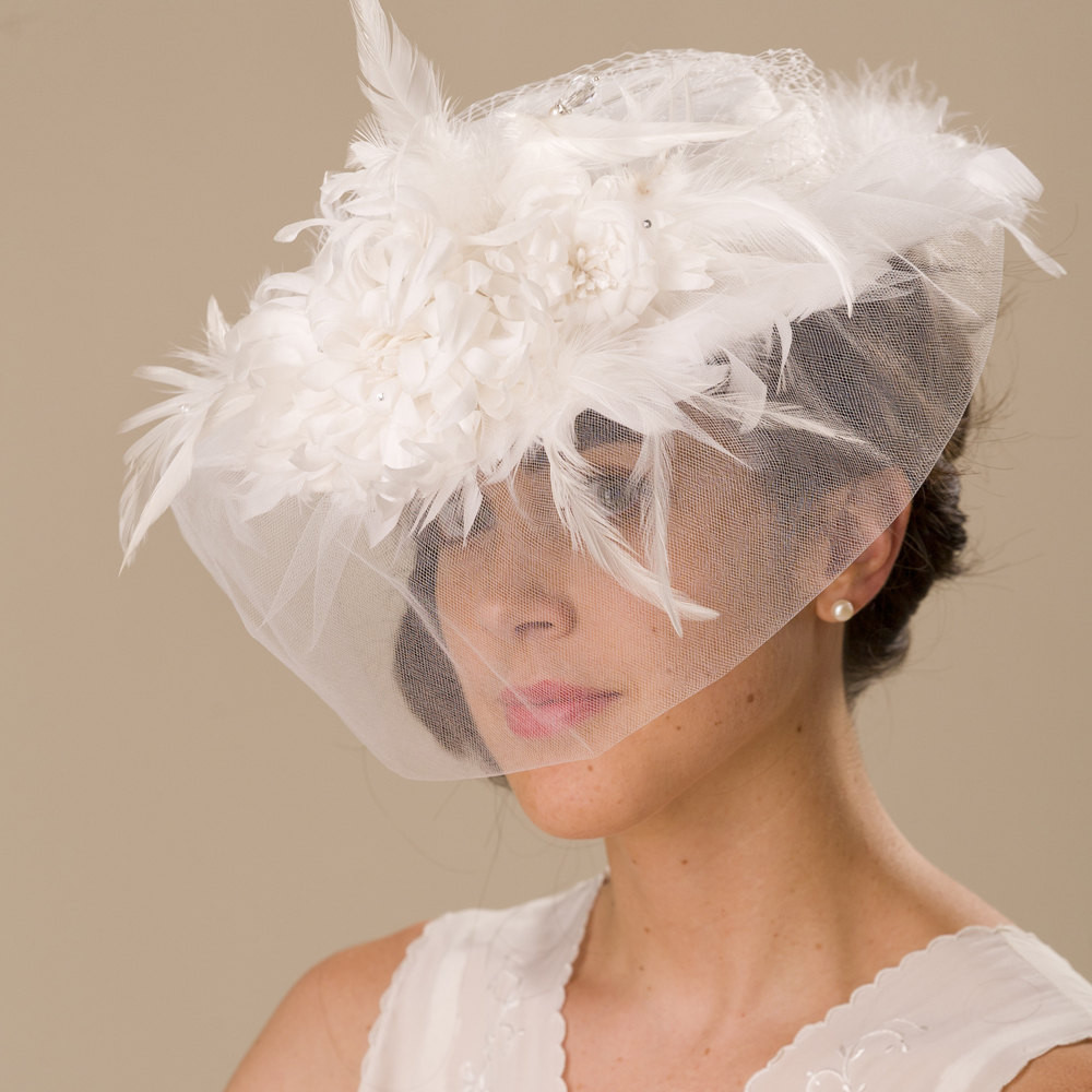 Wedding Veil Hat
 Vintage inspired feather adorned wedding hat