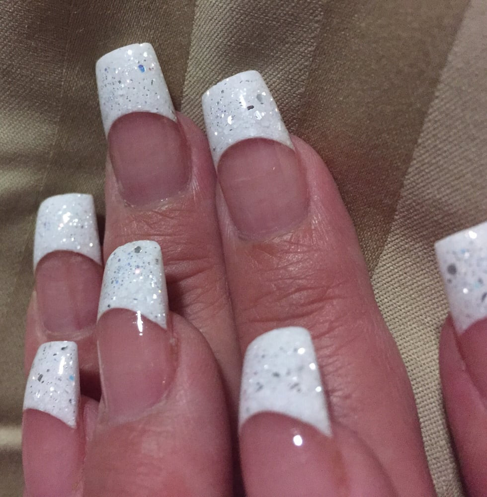 White And Glitter Nails
 Natural nails with pink and white glitter acrylic powder