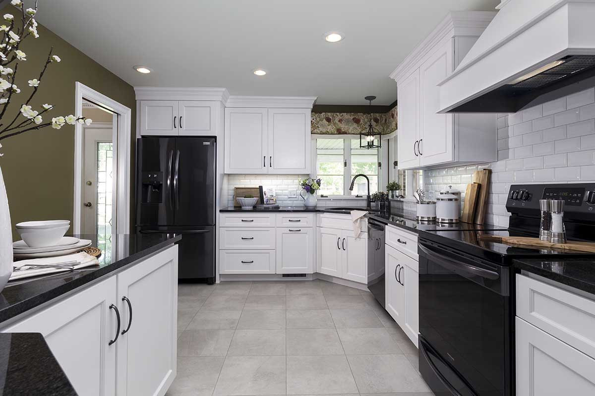 White Kitchen Black Appliances
 KountryWood Cabinetry