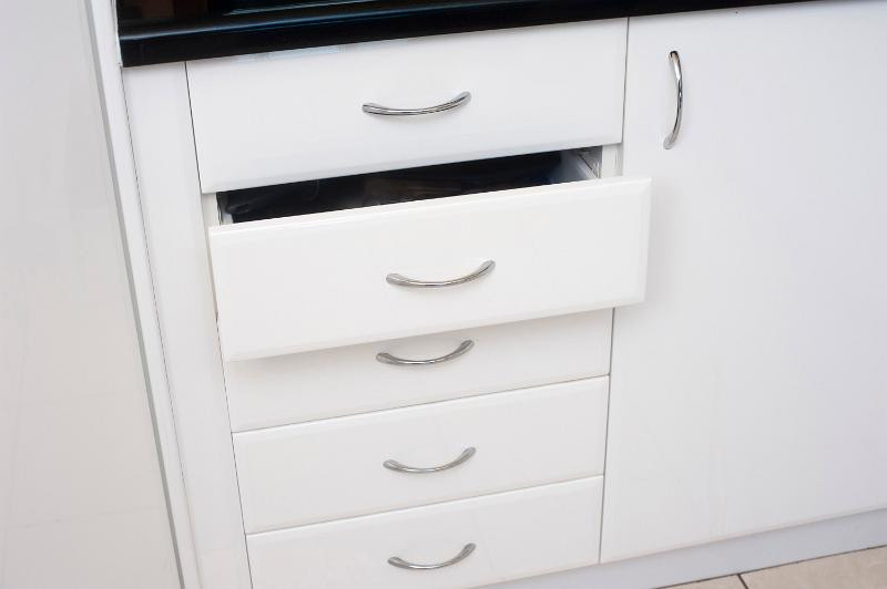 White Kitchen Cabinet Drawers
 Free image of Set of white kitchen drawers