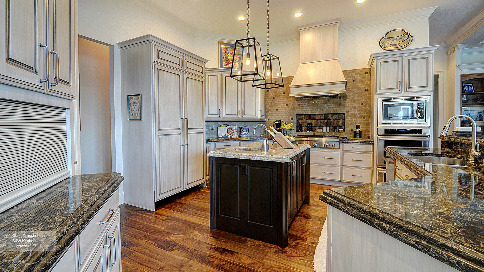 White Kitchen With Dark Island
 f White Cabinets with a Dark Wood Kitchen Island Omega